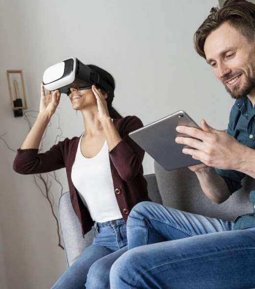 man-woman-having-fun-home-with-virtual-reality-headset-tablet
